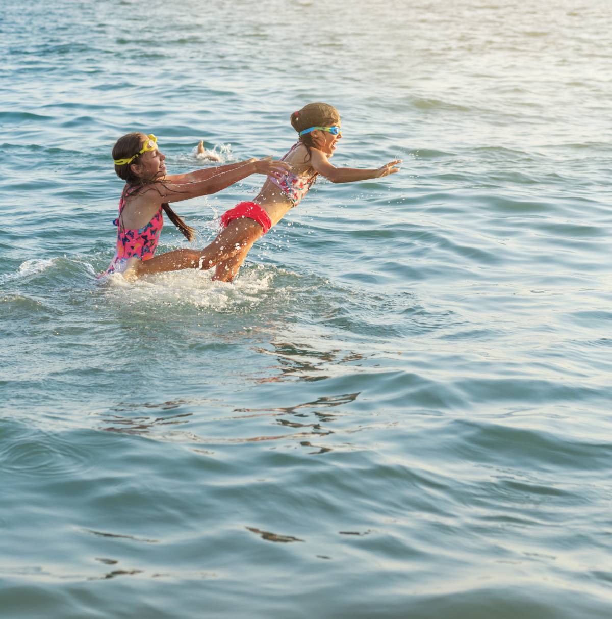 Two kids playing in the water